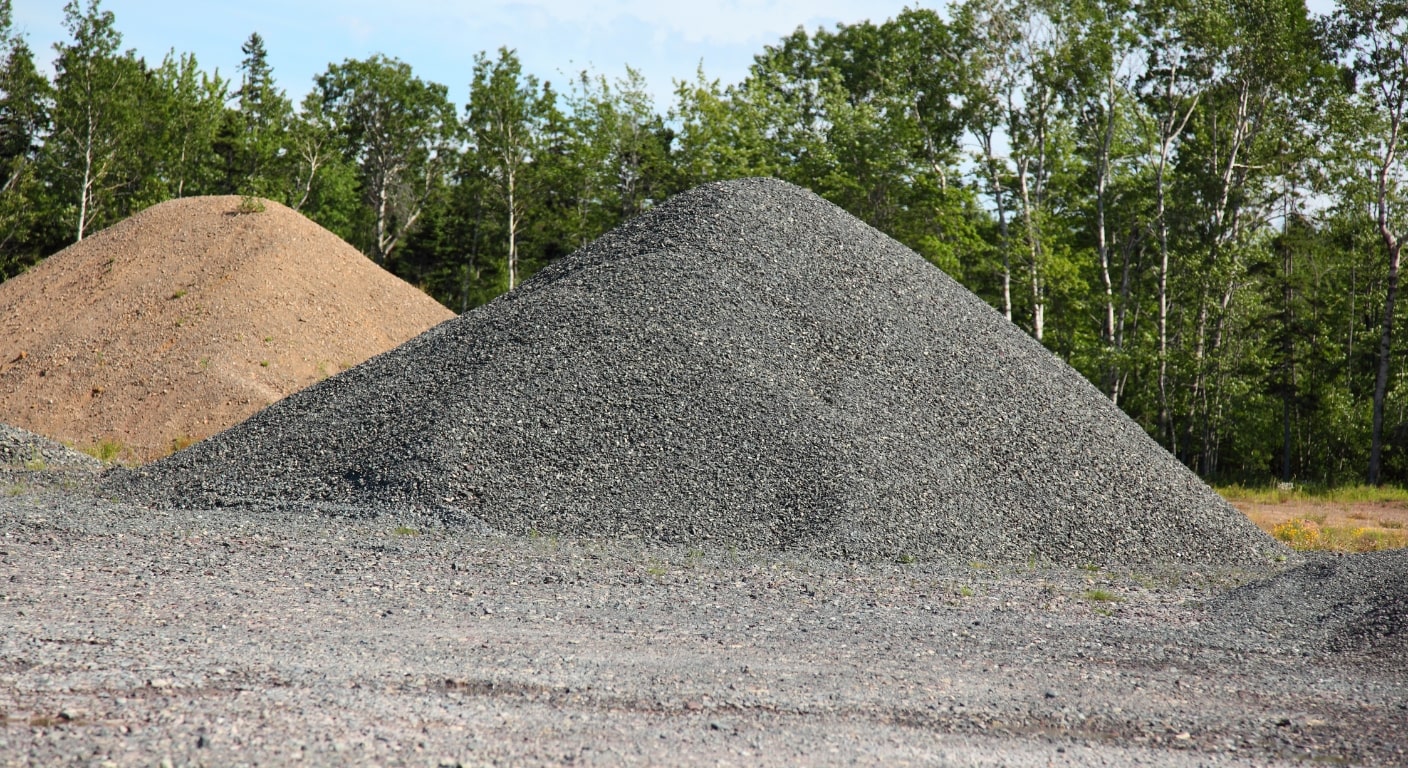 Various mounds of aggregate rock 